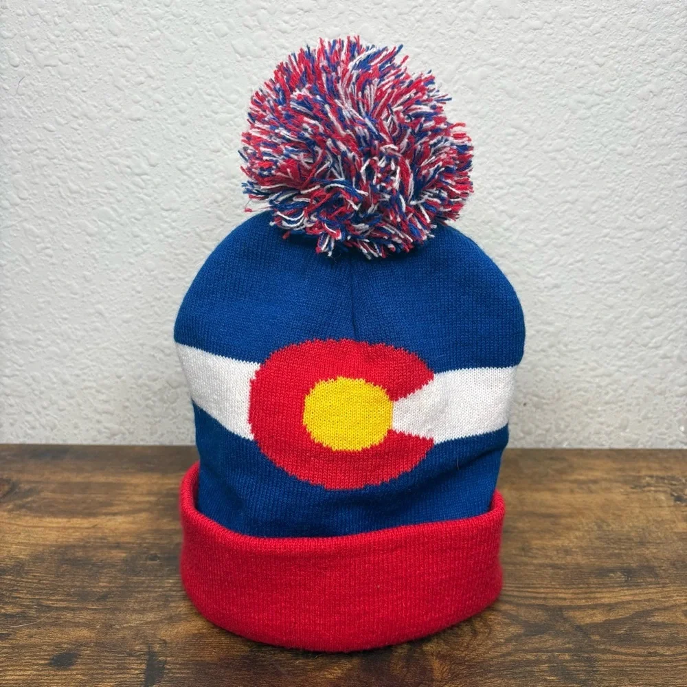 Wilcor 8.7x8.7 sized Blue and Red Colorado Pom-Pom Hat